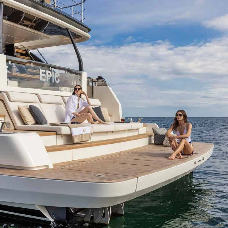 a group of people sitting on a boat aboard SPICA Yacht for Sale