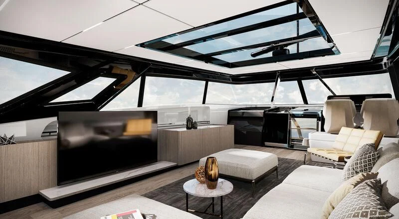 a room with a large tv and a couch aboard SPICA Yacht for Sale