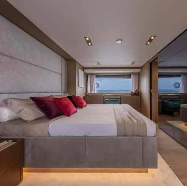 a bed in a room aboard SPICA Yacht for Sale