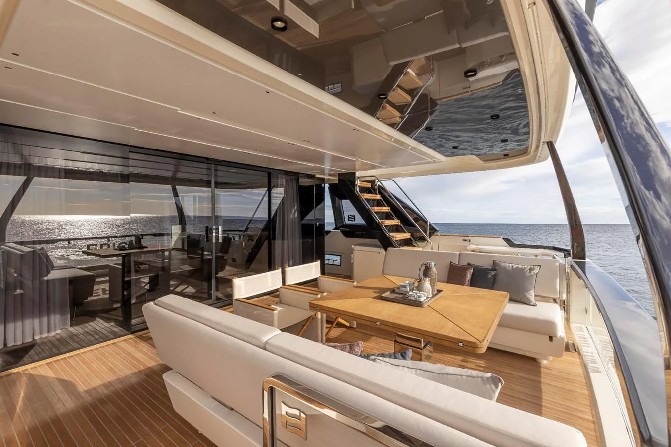 a room with a large window and a view of the ocean aboard SPICA Yacht for Sale