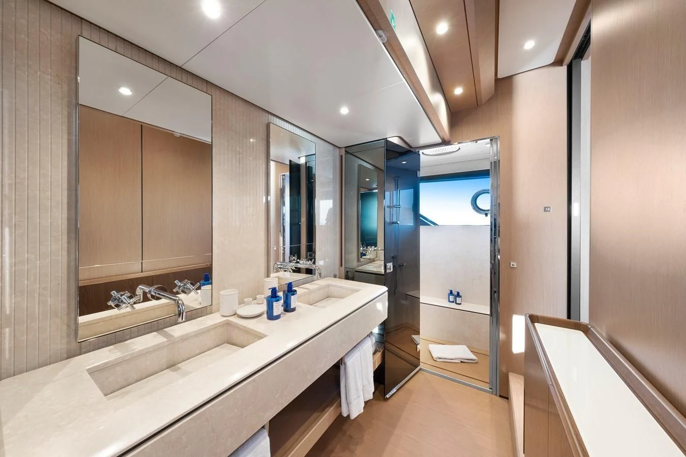 a bathroom with a large mirror aboard SPICA Yacht for Sale