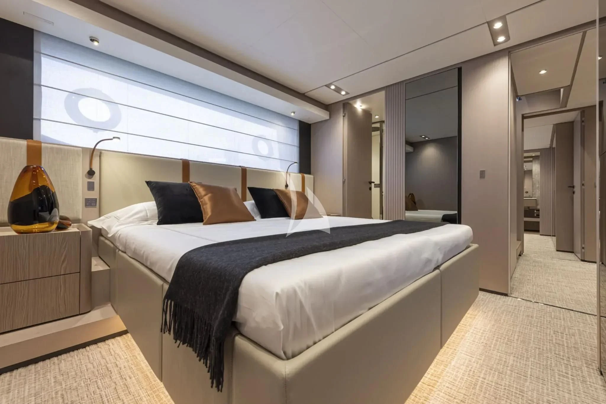 a bed in a room aboard SPICA Yacht for Sale
