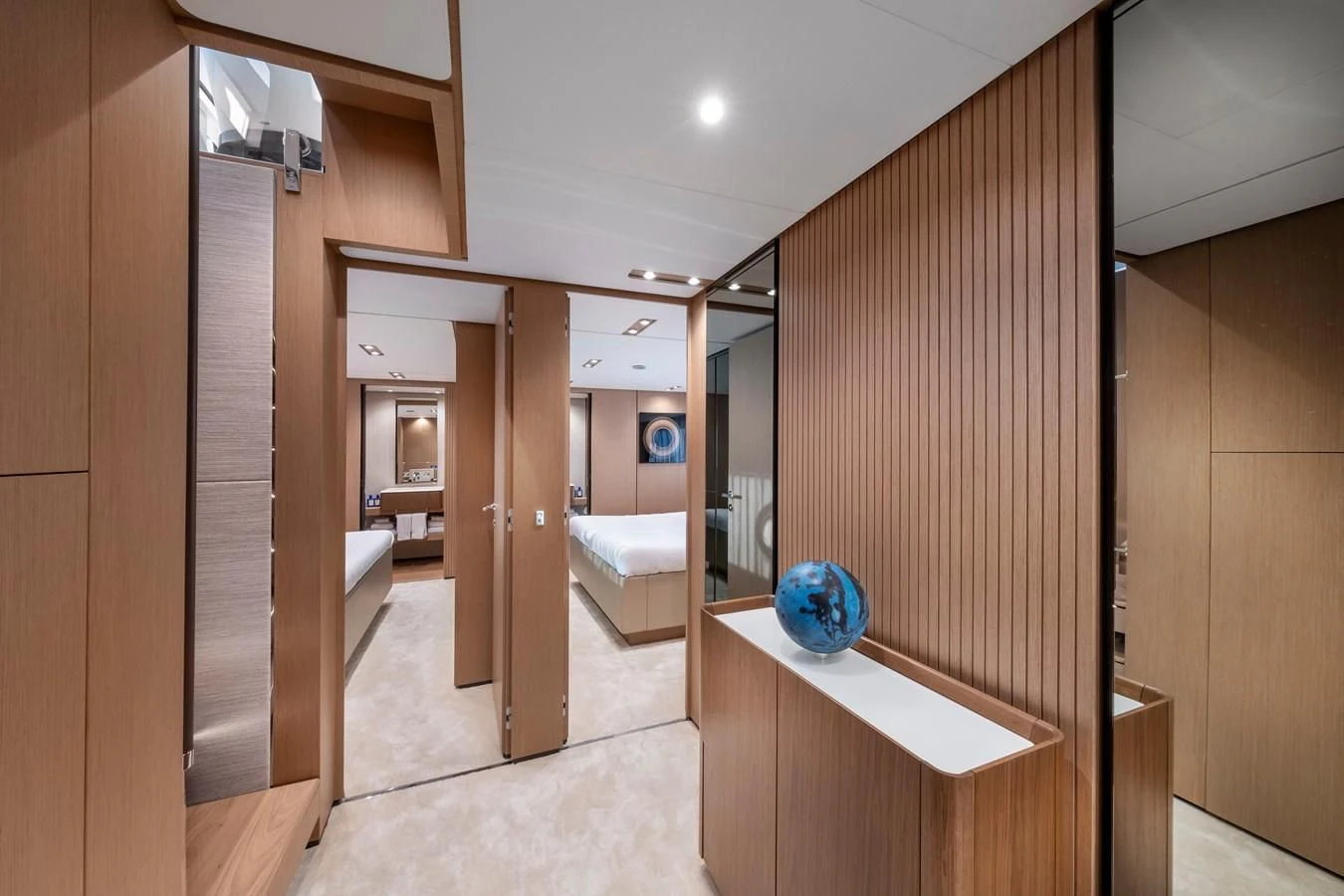 a room with a large mirror and a bench aboard SPICA Yacht for Sale