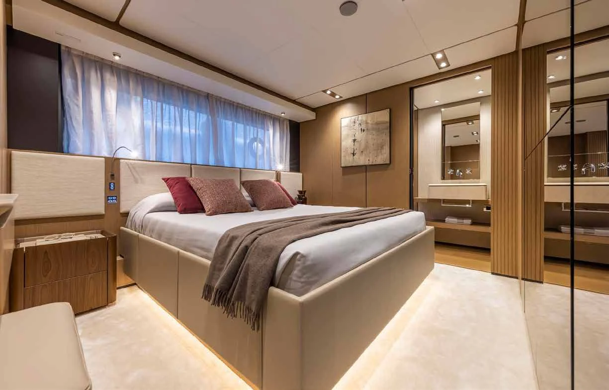 a bed in a room aboard SPICA Yacht for Sale