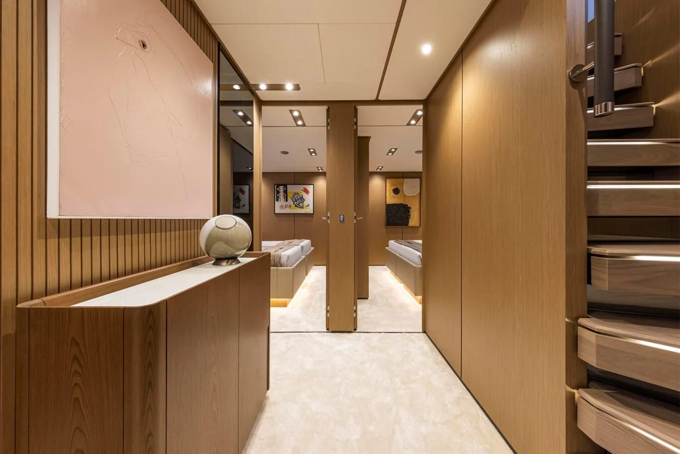 a hallway with a large white wall aboard SPICA Yacht for Sale