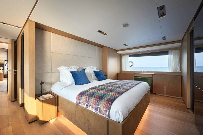 a bed in a room aboard SPICA Yacht for Sale