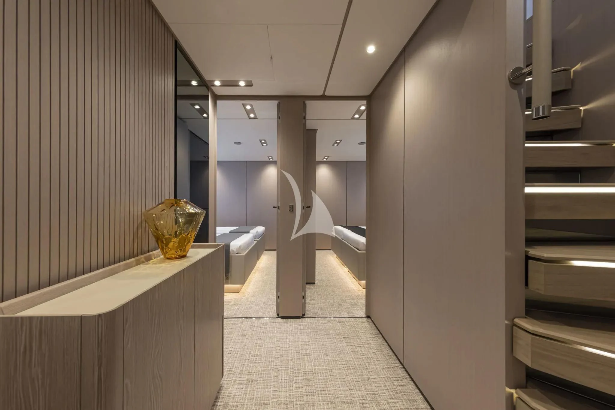 a hallway with white walls aboard SPICA Yacht for Sale