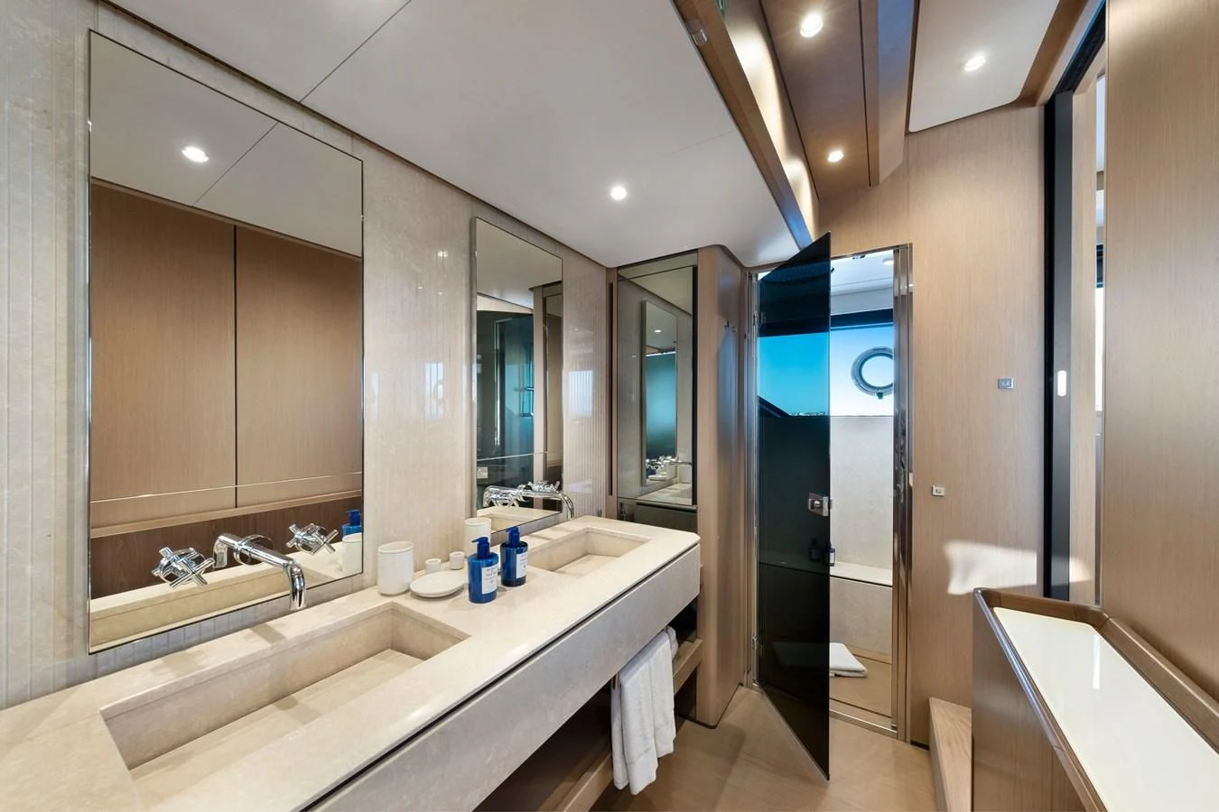 a bathroom with a large mirror aboard SPICA Yacht for Sale