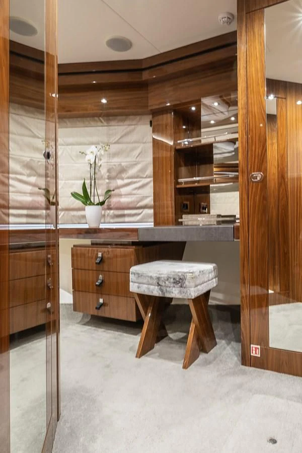 a room with a table and stool aboard AFTER 8 II Yacht for Sale