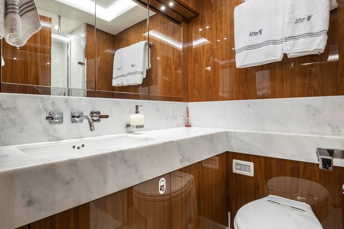 a bathroom with a sink and a toilet aboard AFTER 8 II Yacht for Sale
