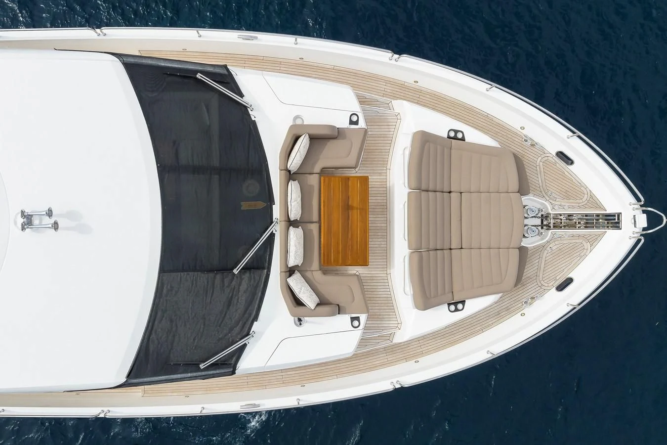 a white boat with a black and gold stripe aboard AFTER 8 II Yacht for Sale