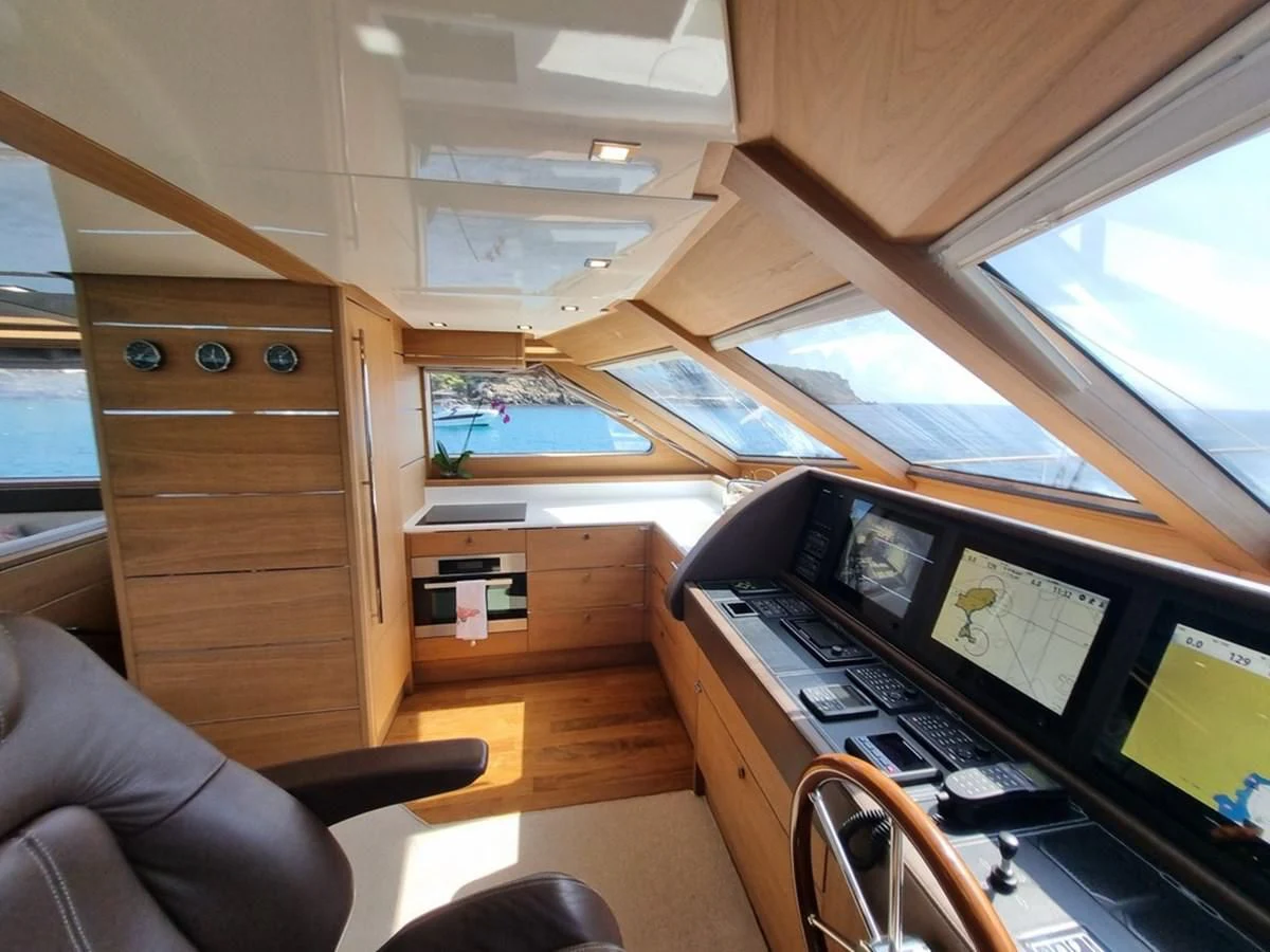 a room with a desk and computer aboard PLEIADES Yacht for Sale