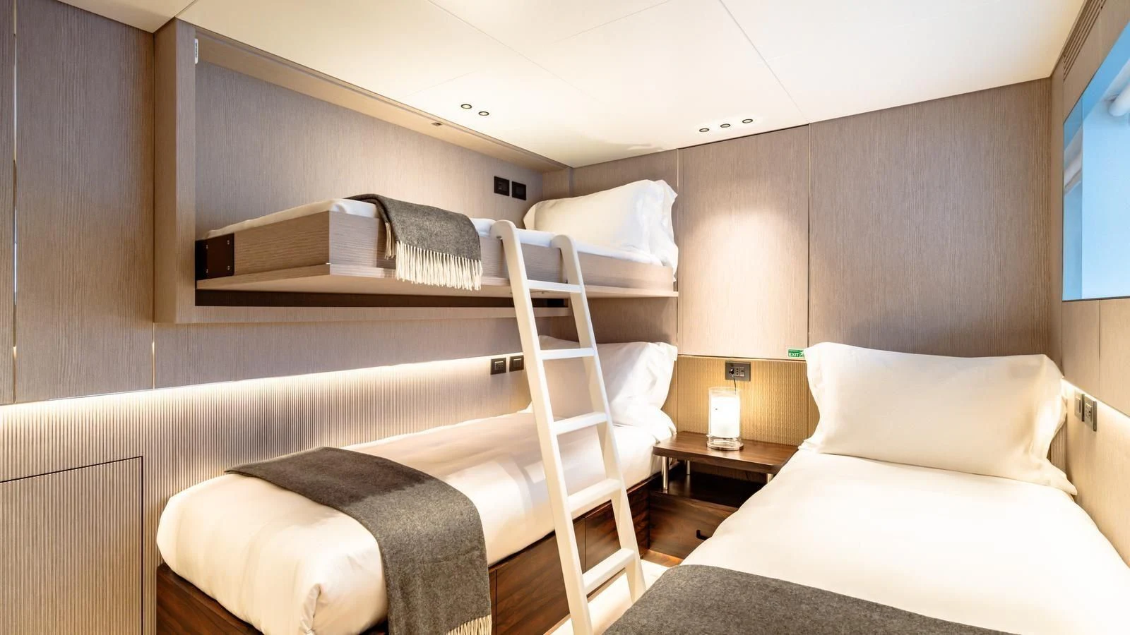 a room with two beds aboard TOSUN Yacht for Sale