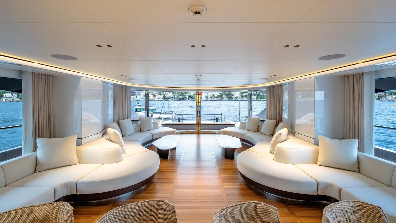 a living room with a large window aboard TOSUN Yacht for Sale