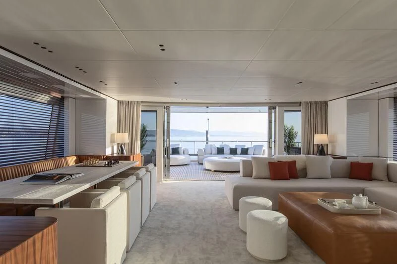 a living room with a large window aboard TOSUN Yacht for Sale
