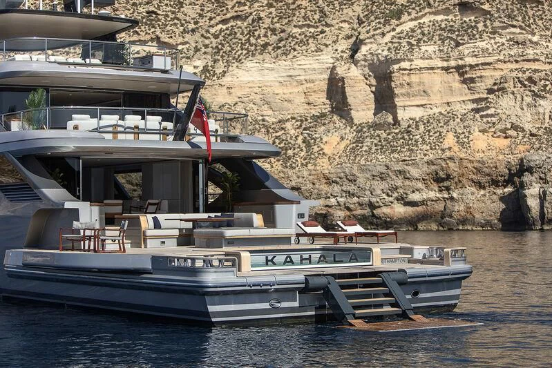 a boat docked at a pier aboard TOSUN Yacht for Sale