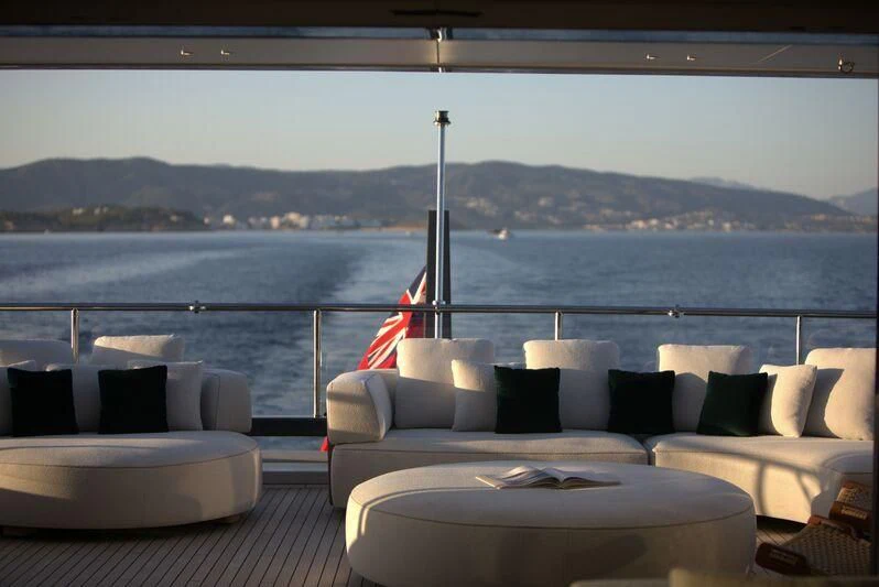 a living room with a large window aboard TOSUN Yacht for Sale