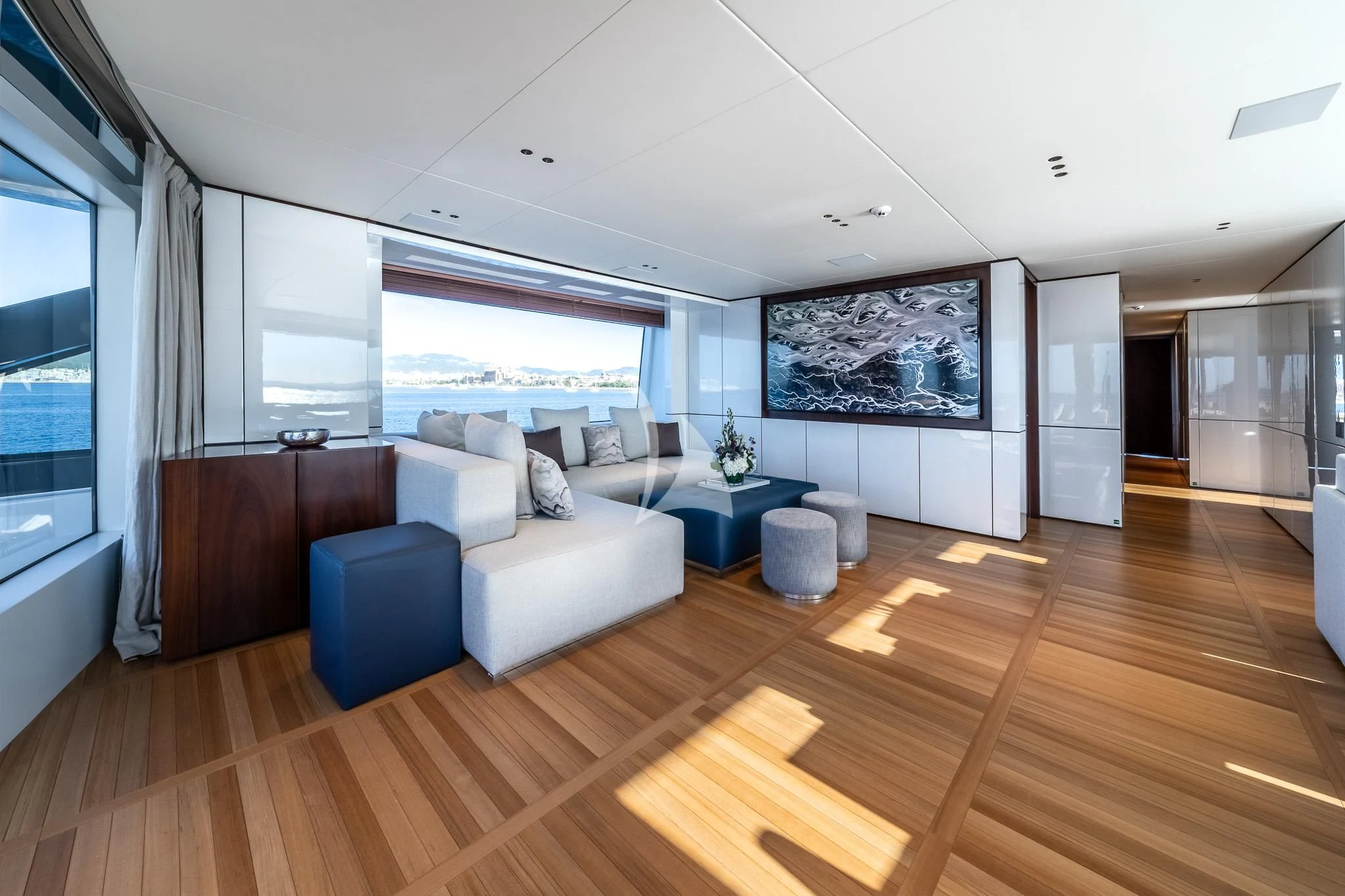 a living room with a wood floor aboard TOSUN Yacht for Sale