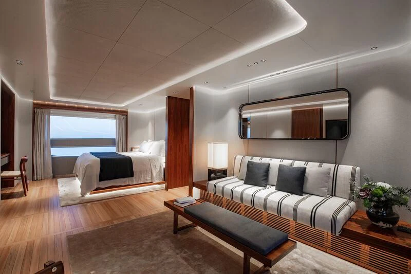 a living room with a couch and a coffee table aboard TOSUN Yacht for Sale