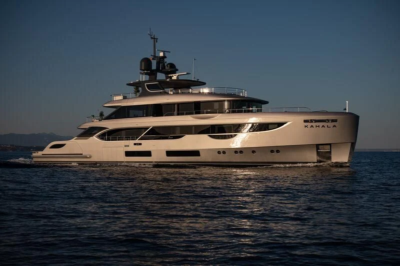 a large white yacht in the water aboard TOSUN Yacht for Sale