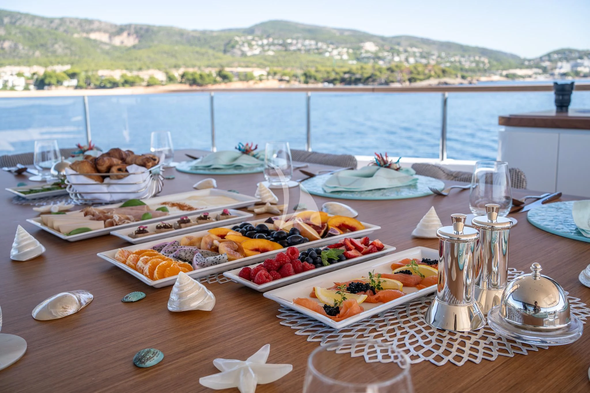 a table with food on it aboard TOSUN Yacht for Sale