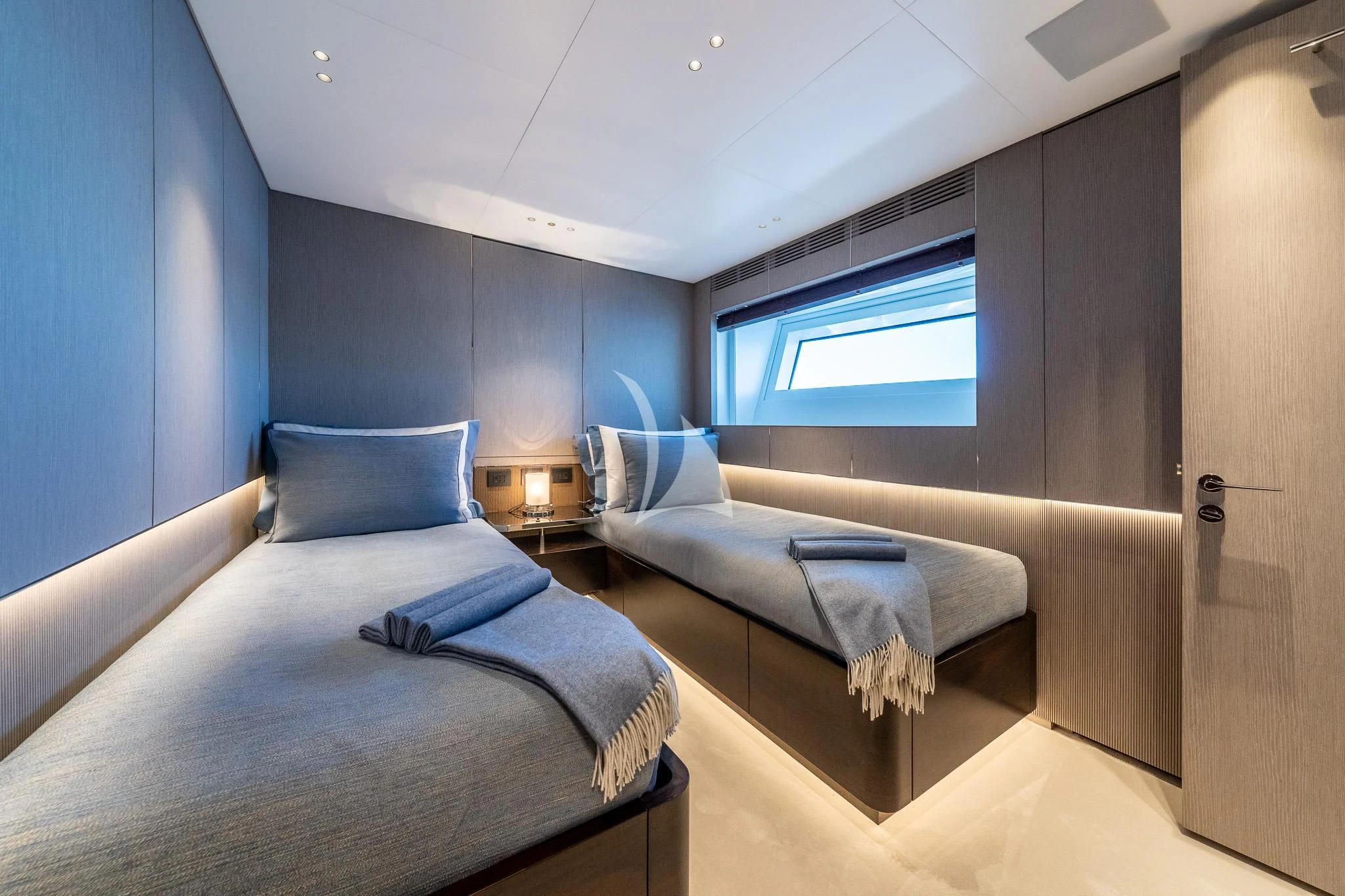 a room with two beds aboard TOSUN Yacht for Sale