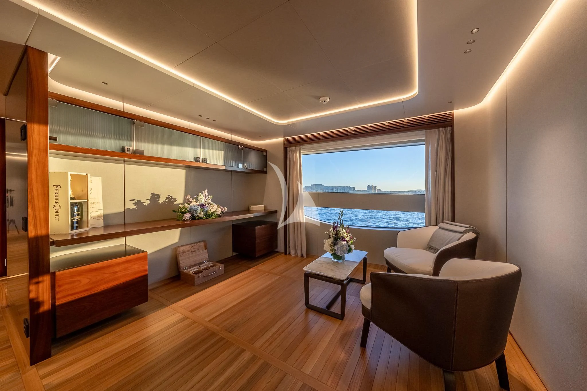 a living room with a large window aboard TOSUN Yacht for Sale