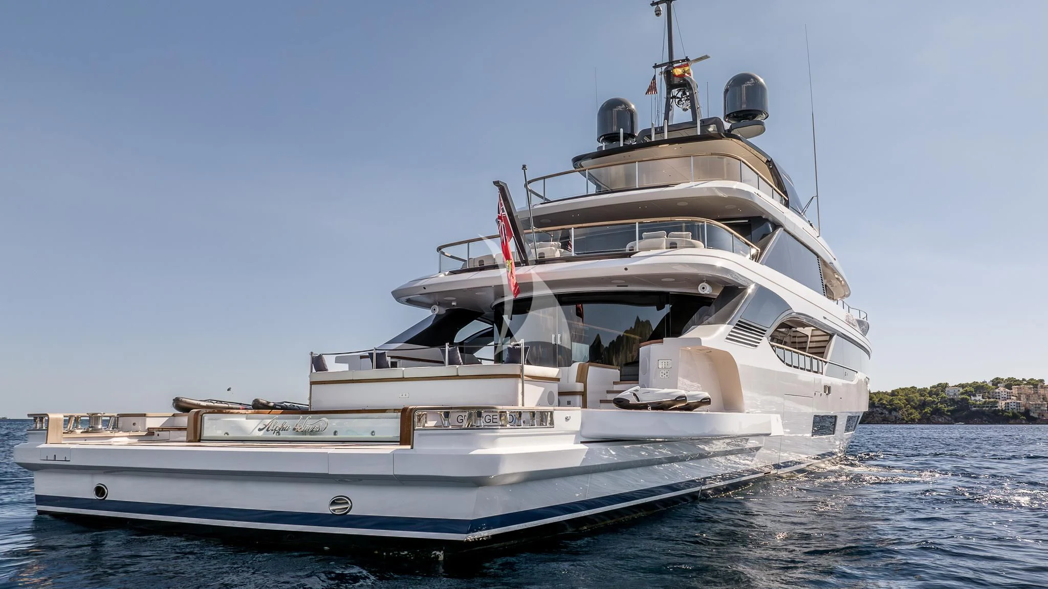 a large white boat on the water aboard TOSUN Yacht for Sale