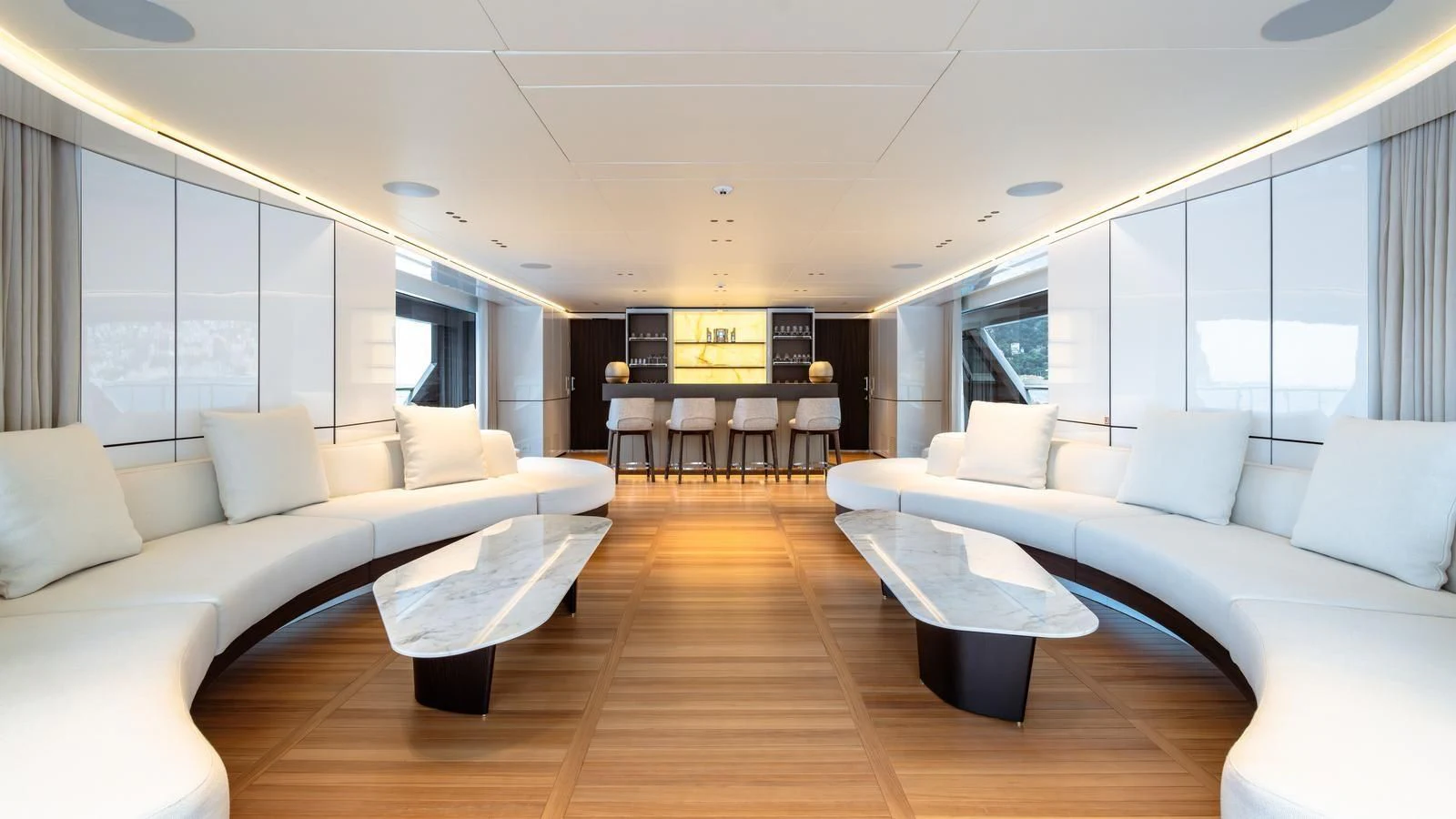 a living room with a couch and a table aboard TOSUN Yacht for Sale