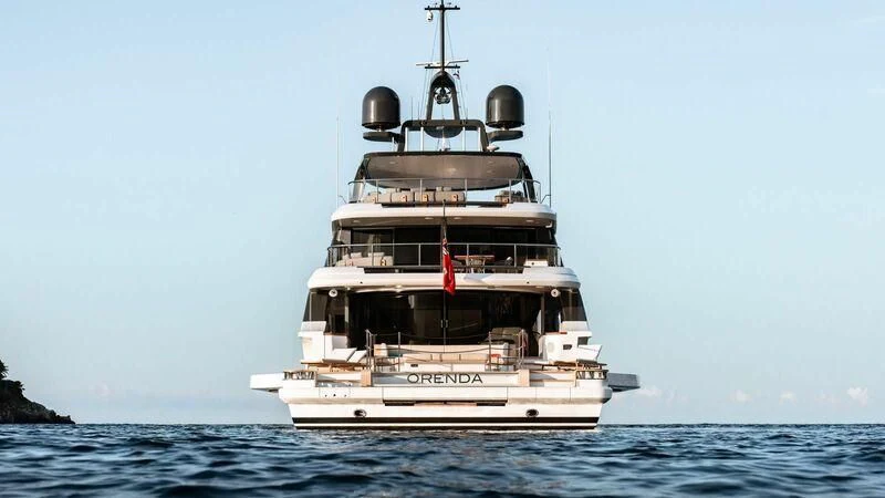 a large boat in the water aboard TOSUN Yacht for Sale