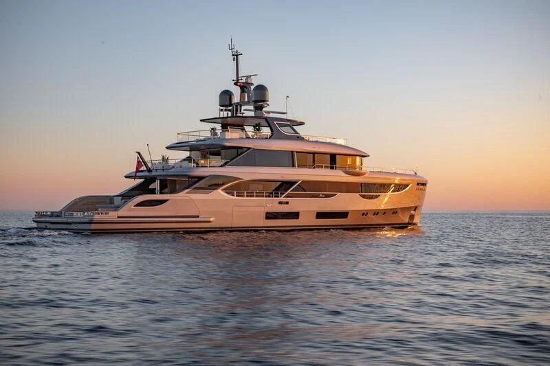 a large ship in the water aboard TOSUN Yacht for Sale