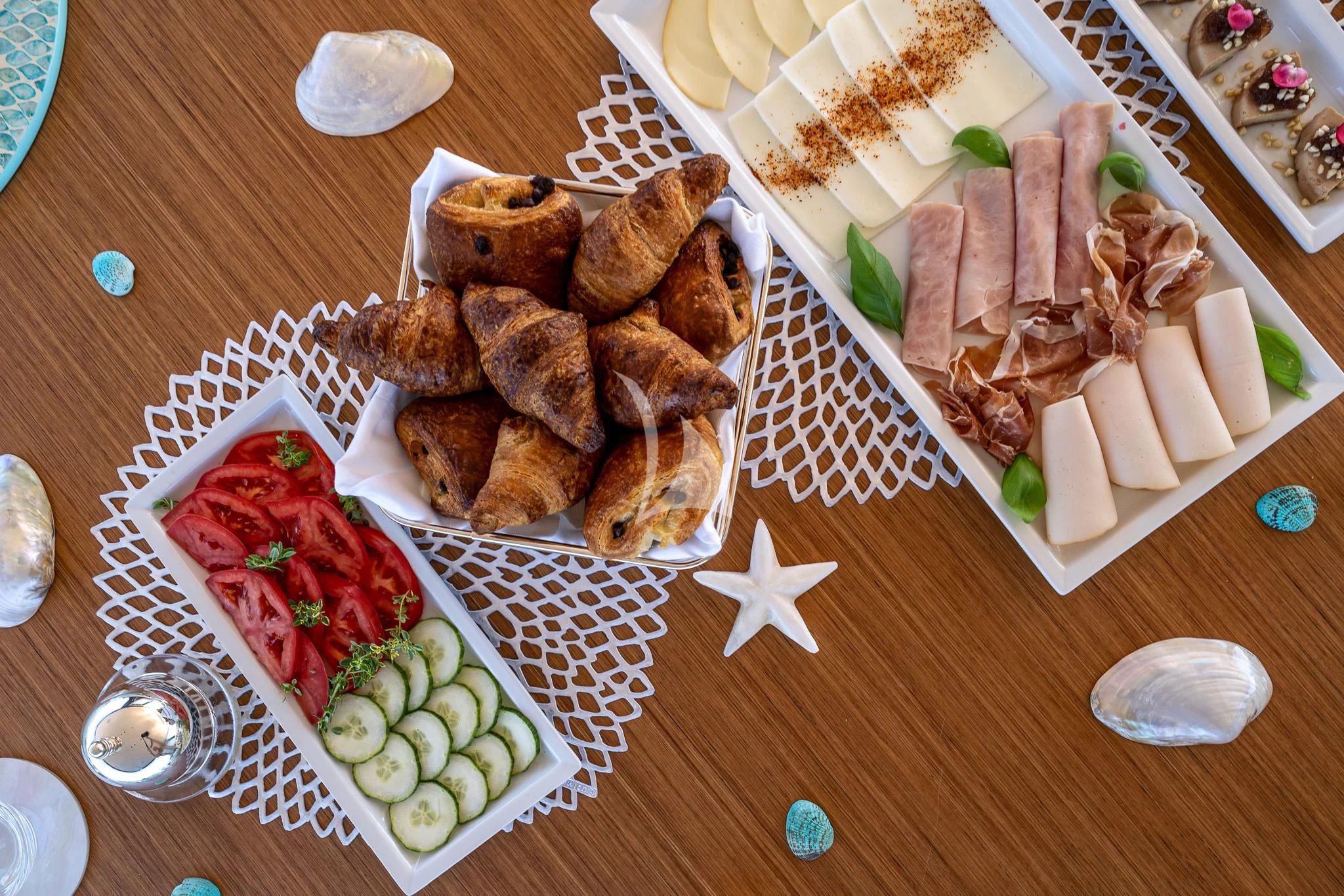 a table with food on it aboard TOSUN Yacht for Sale