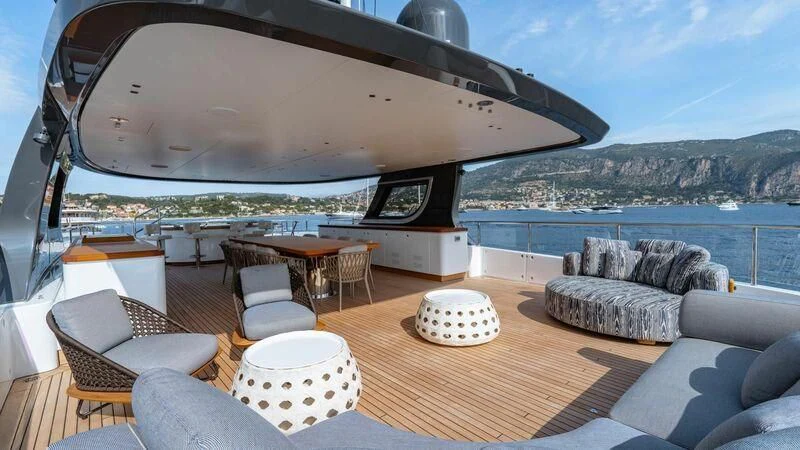 a living room with a large patio aboard TOSUN Yacht for Sale