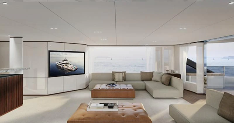 a living room with a large screen aboard TOSUN Yacht for Sale