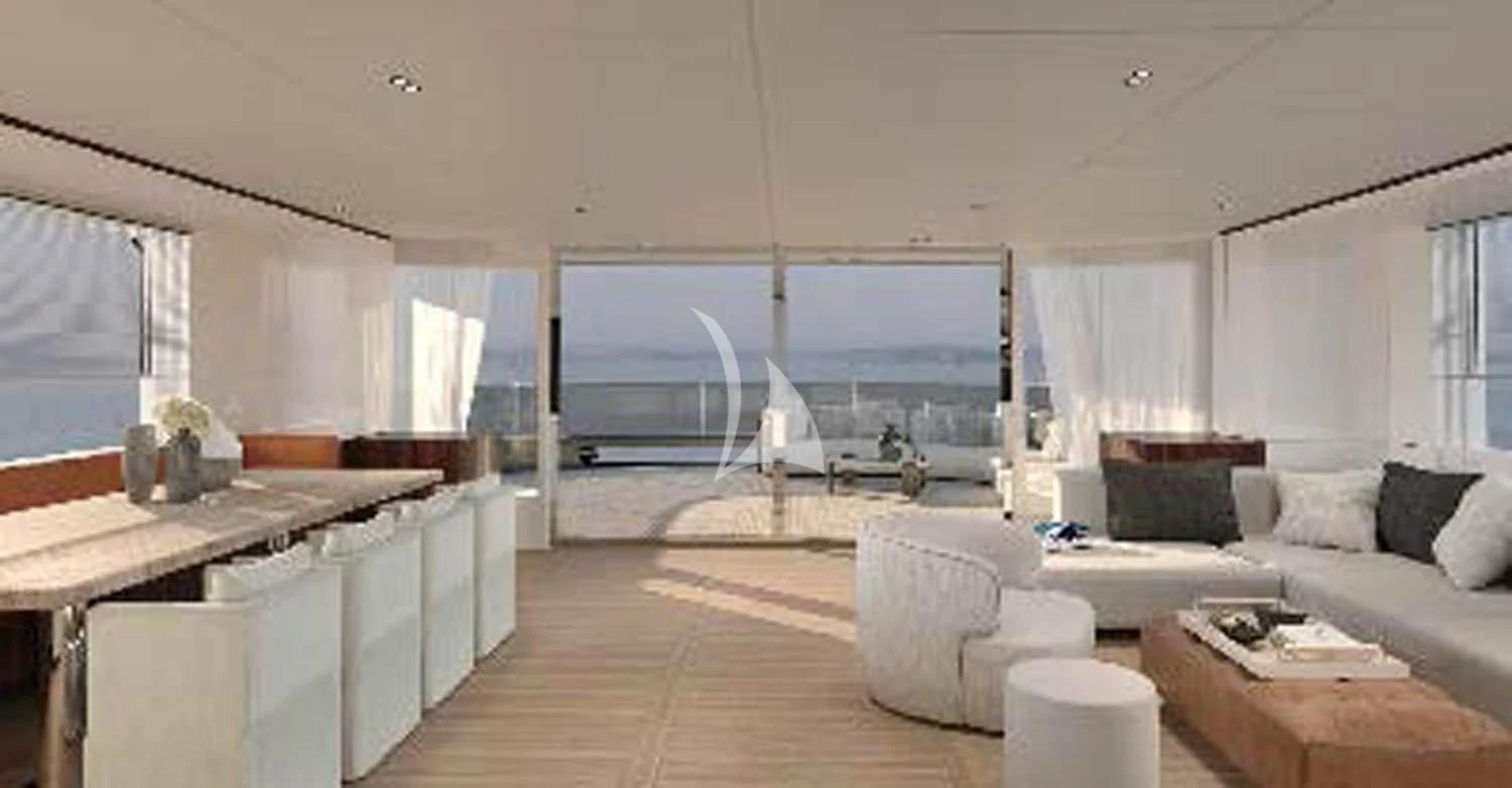 a living room with a large screen aboard TOSUN Yacht for Sale