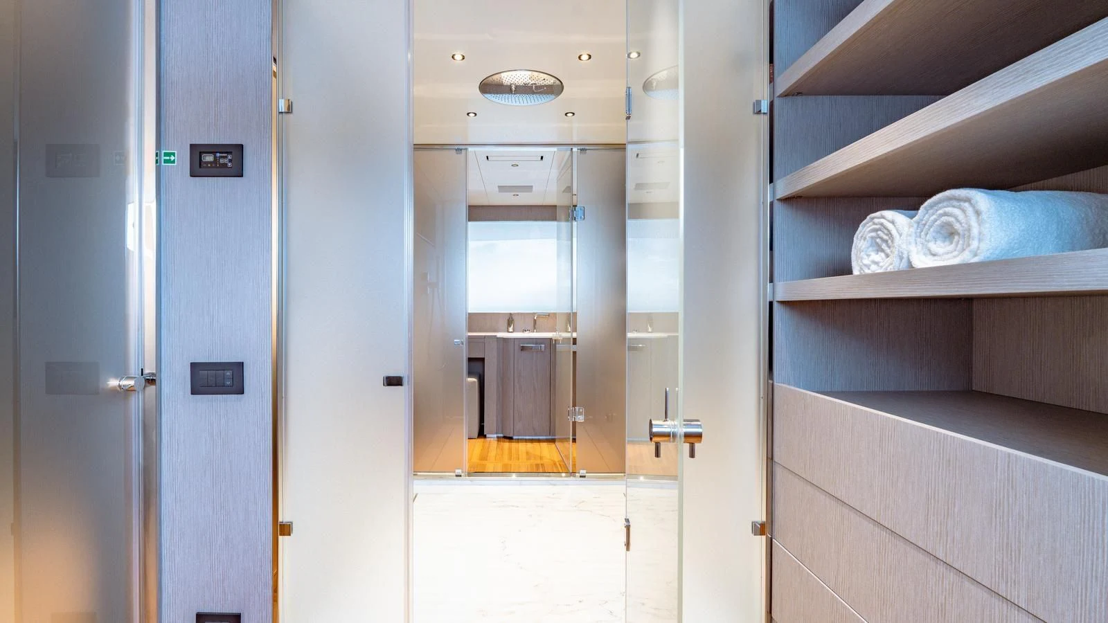 a room with a closet and a bed aboard TOSUN Yacht for Sale