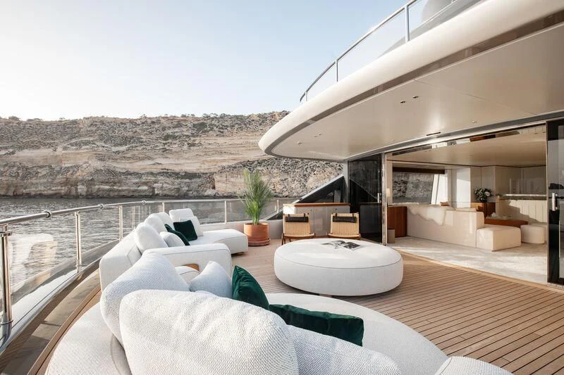 a modern house with a large balcony aboard TOSUN Yacht for Sale