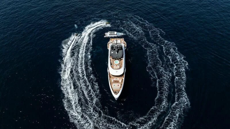 a car driving on the water aboard TOSUN Yacht for Sale