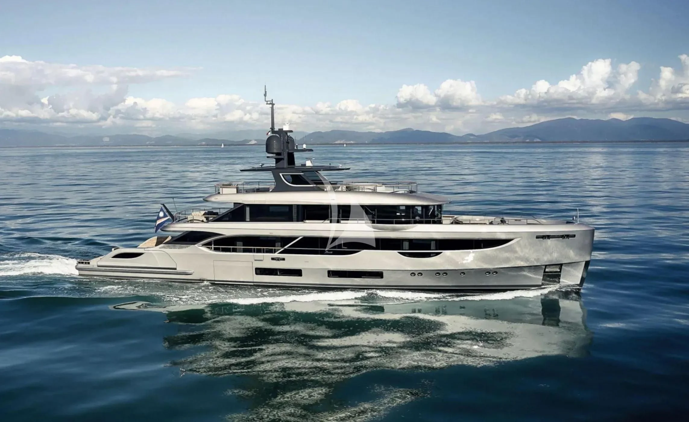 a white yacht in the water aboard TOSUN Yacht for Sale