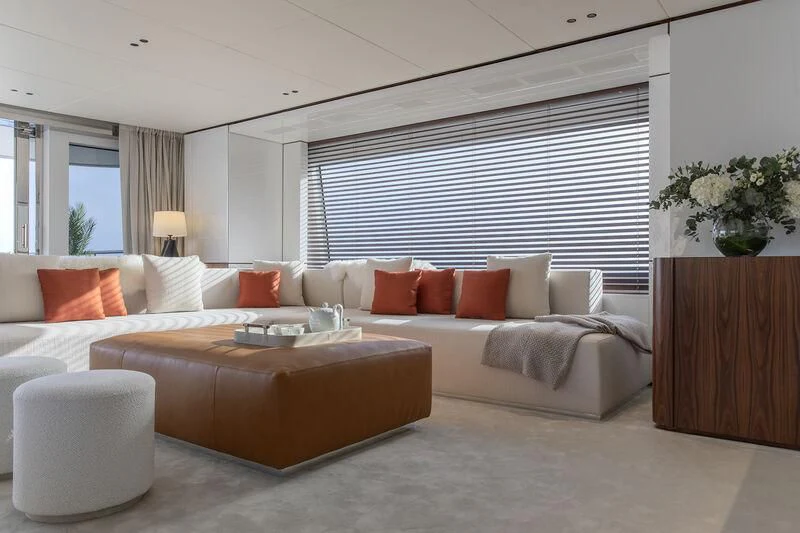a living room with a couch and a table aboard TOSUN Yacht for Sale