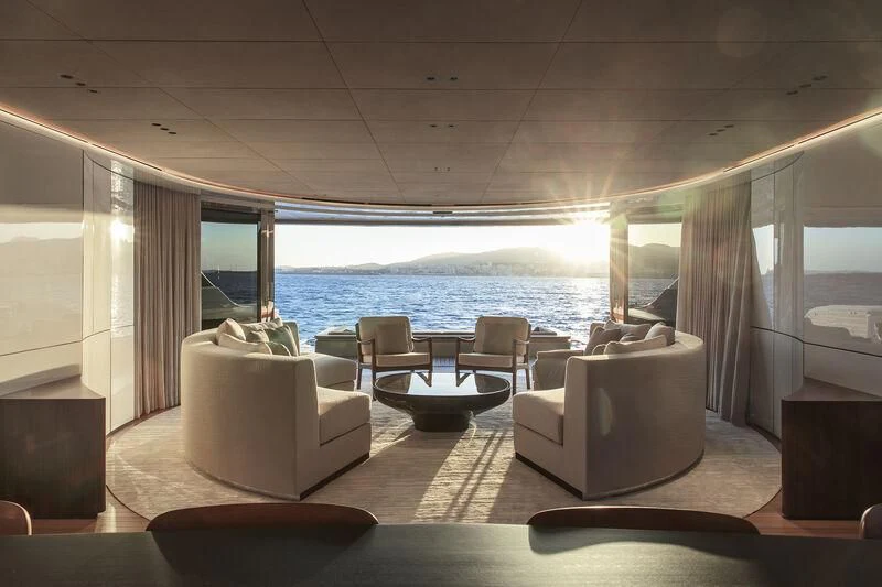 a living room with a large body of water aboard TOSUN Yacht for Sale