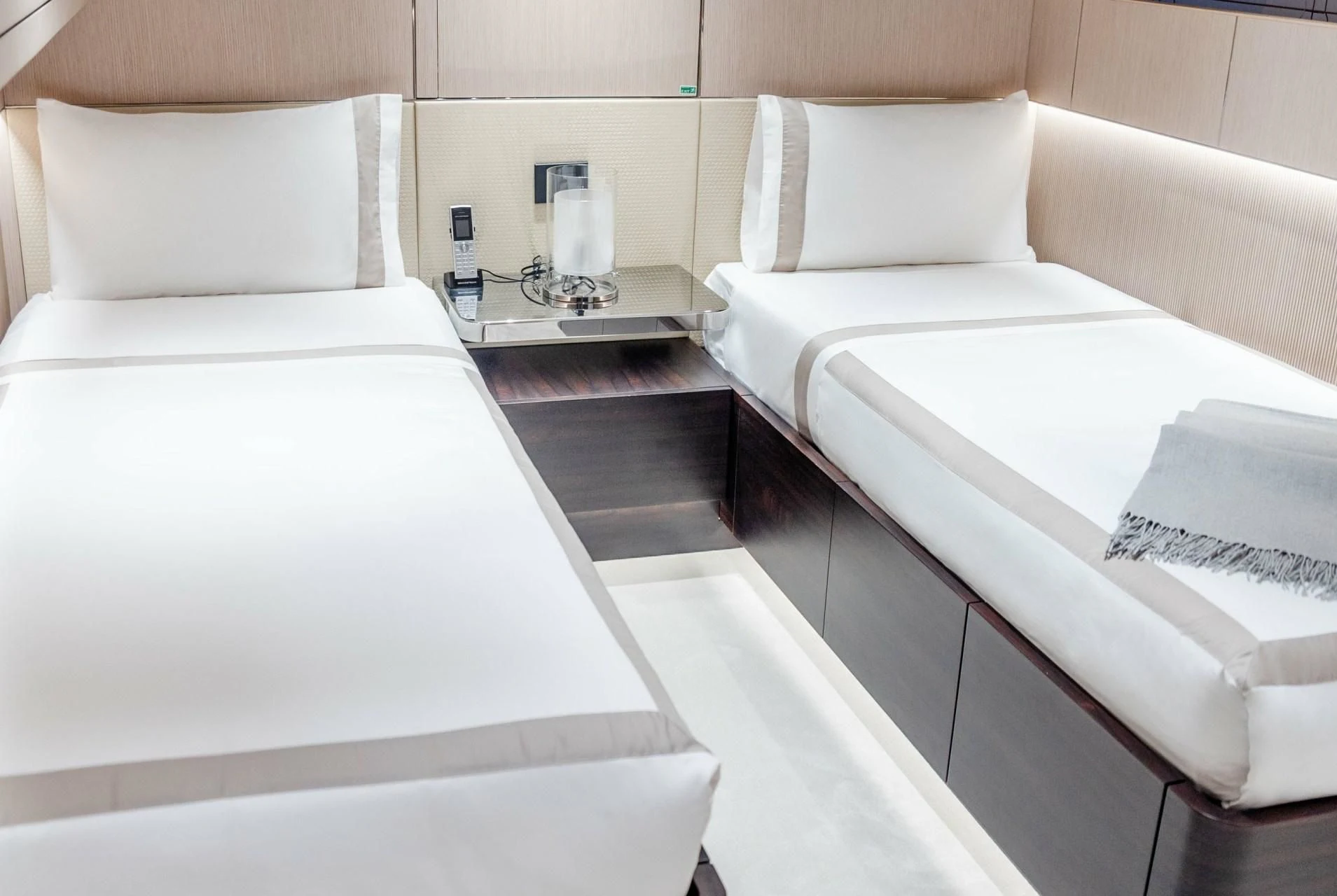 a room with two beds aboard TOSUN Yacht for Sale