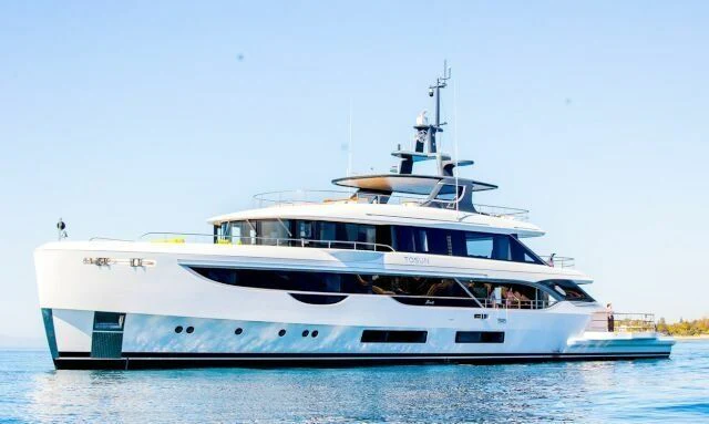 a large white yacht aboard TOSUN Yacht for Sale