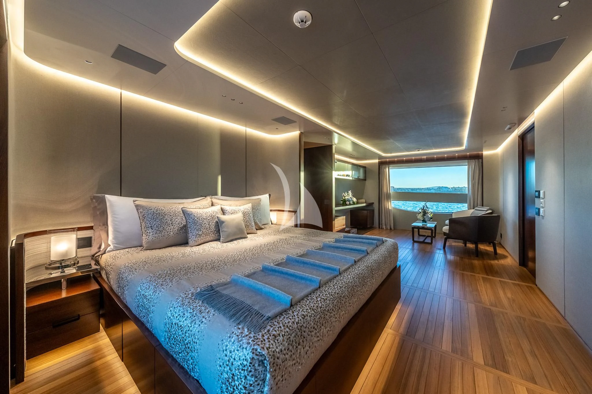 a large bed in a room aboard TOSUN Yacht for Sale