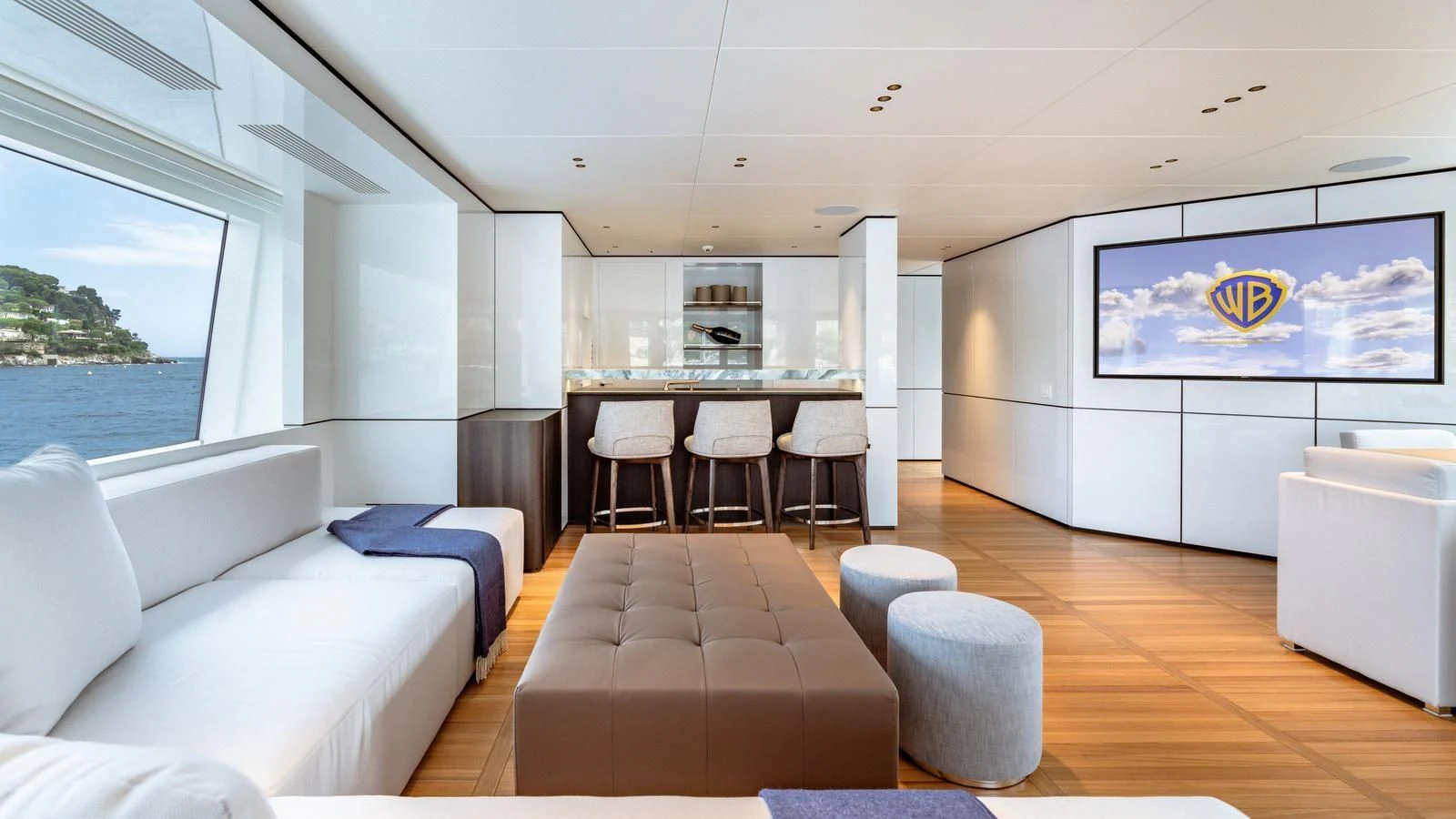 a room with a couch and a table and chairs aboard TOSUN Yacht for Sale