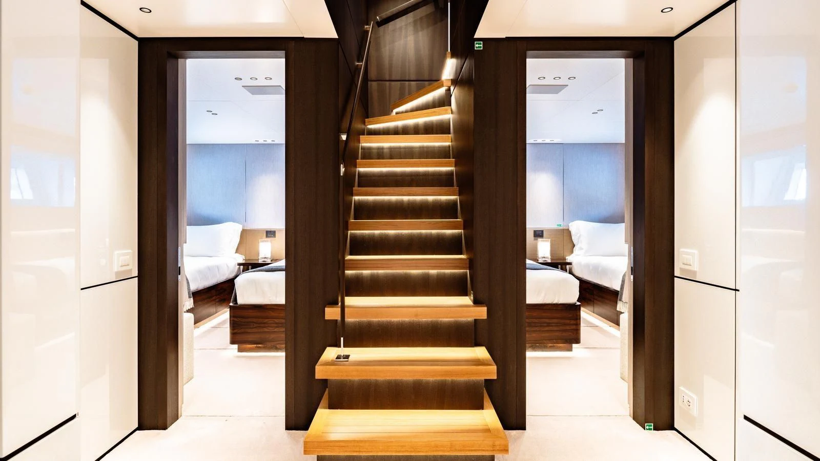 a set of stairs leading to a bedroom aboard TOSUN Yacht for Sale
