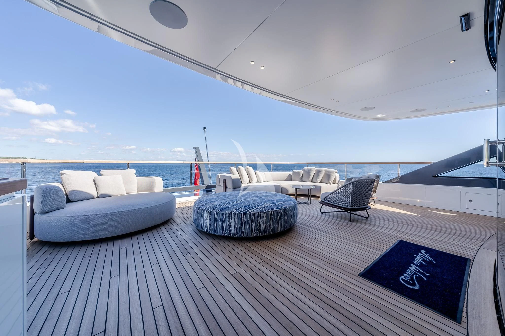 a large room with a large balcony aboard TOSUN Yacht for Sale