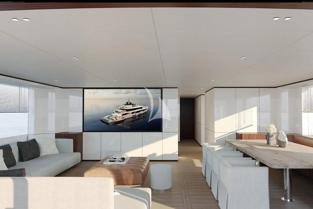a modern living room with a large screen aboard TOSUN Yacht for Sale
