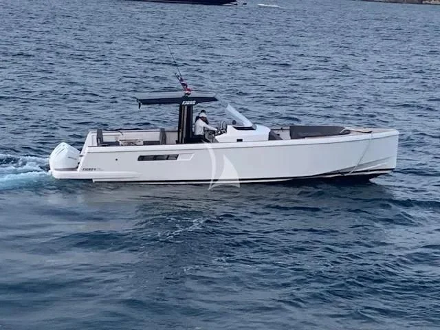 a white boat in the water aboard TOSUN Yacht for Sale