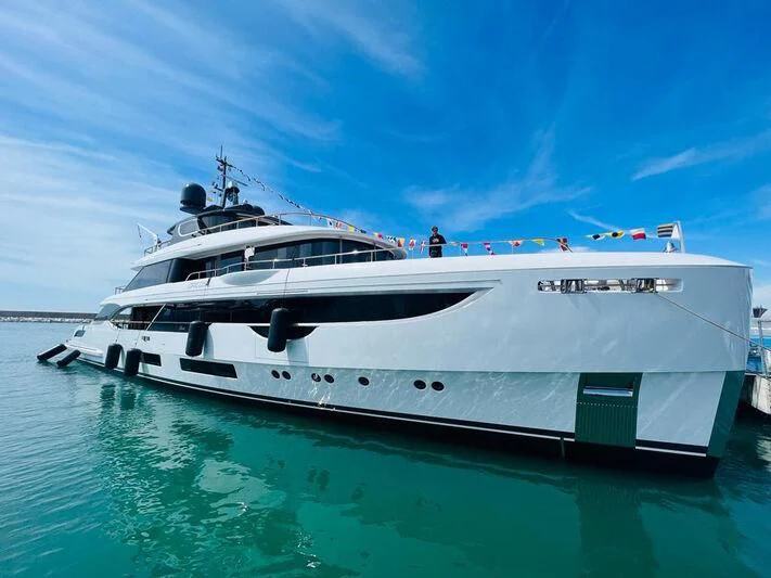 a white yacht in the water aboard TOSUN Yacht for Sale